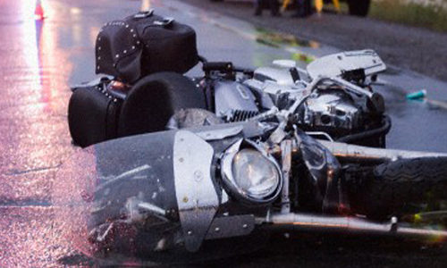 Motorcycle accident on Trans Canada Highway 29 Jun 2008, Nairn and Hyman, Ontario, Canada --- Accident on the Trans Canada Highway, near Nairn Centre, Ontario, Canada on June 29, 2008. The motorcycle driver was an off duty police officer who had a fatal head on collision with an oncoming vehicle. --- Image by © Thomas Fricke/Corbis